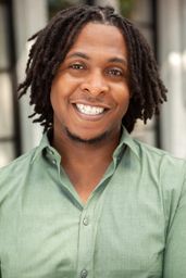 Newsmilinggreenheadshot